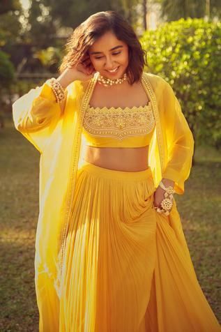 Yellow pleated lehenga with cape